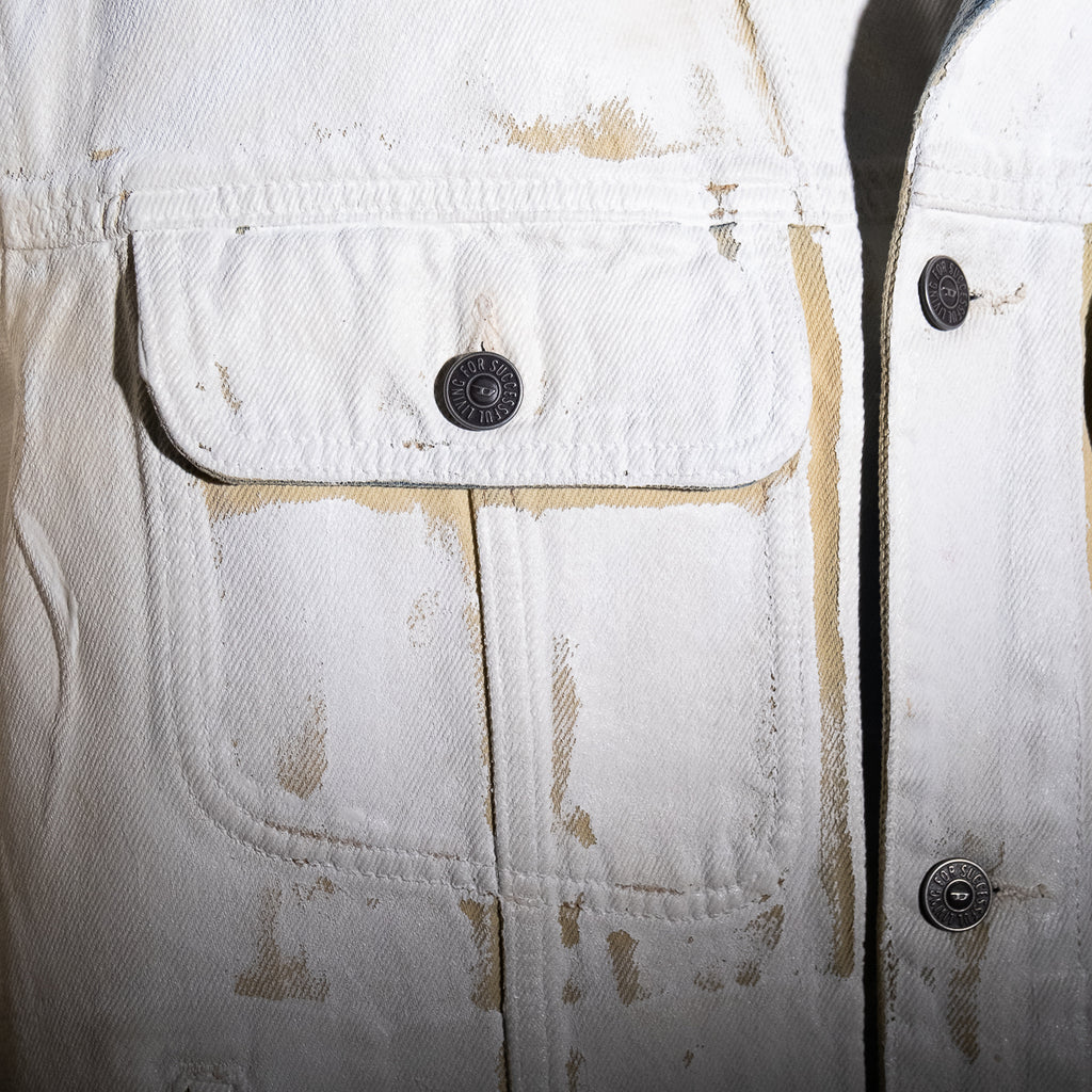 Painted cracked denim jeans