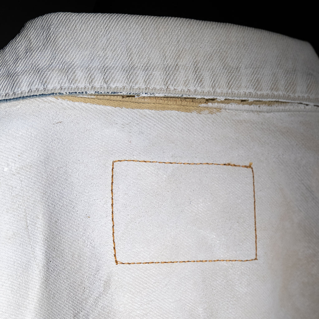 Painted cracked denim jeans