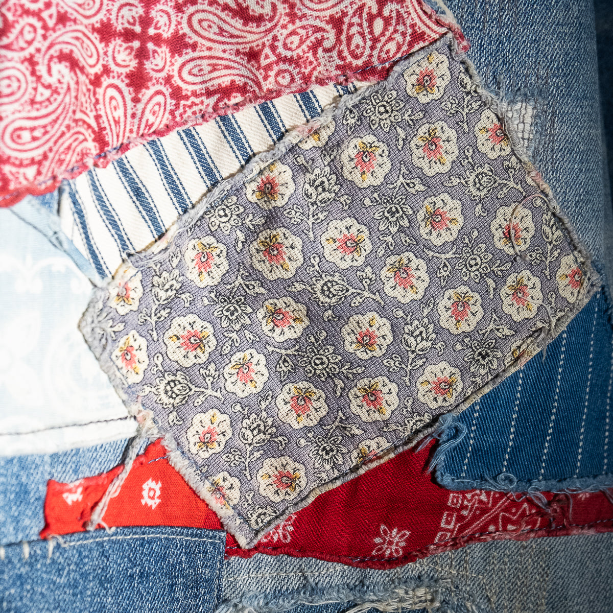 Repaired patchwork jeans