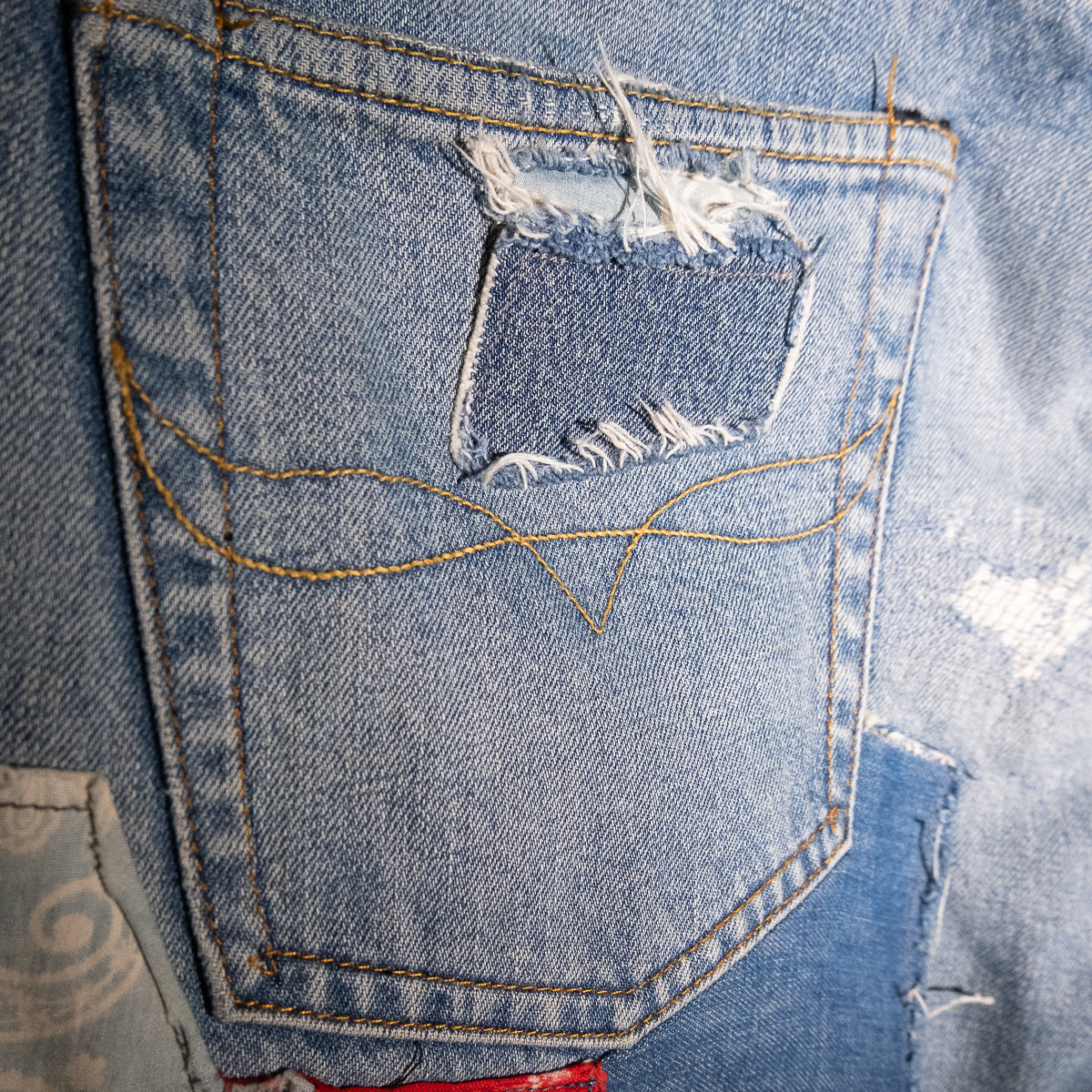 Repaired patchwork jeans