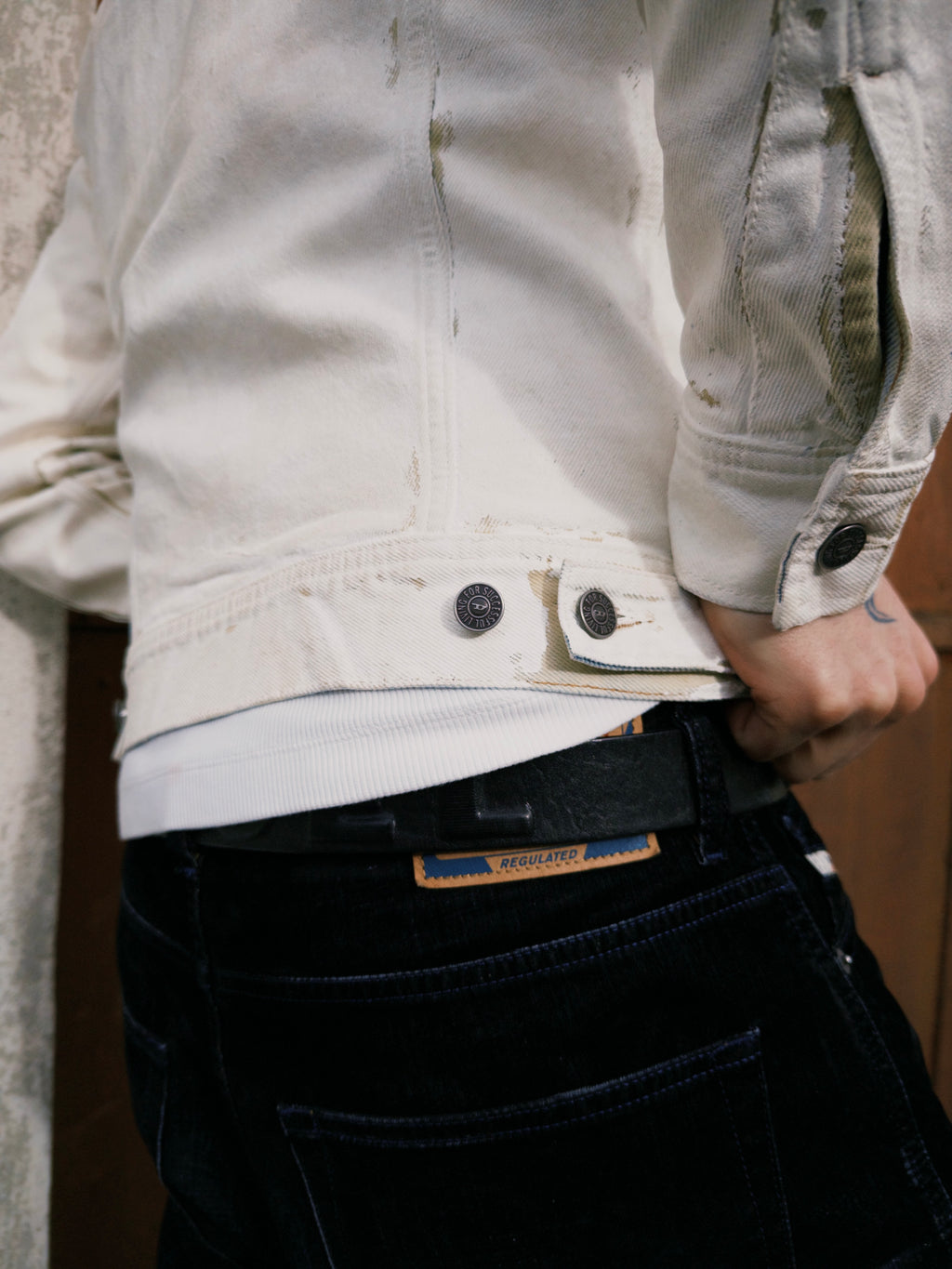 Painted cracked denim jeans