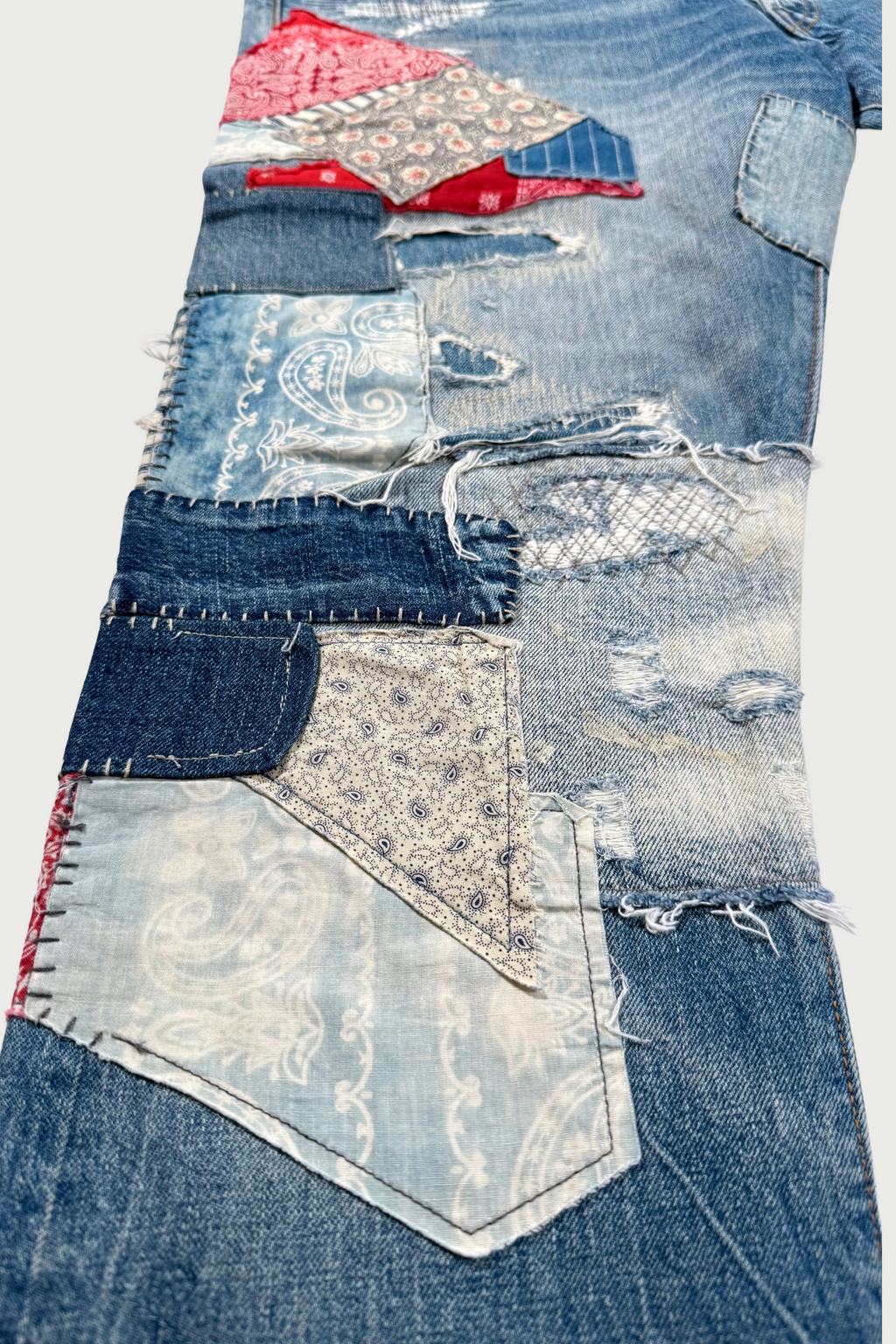 Repaired patchwork jeans