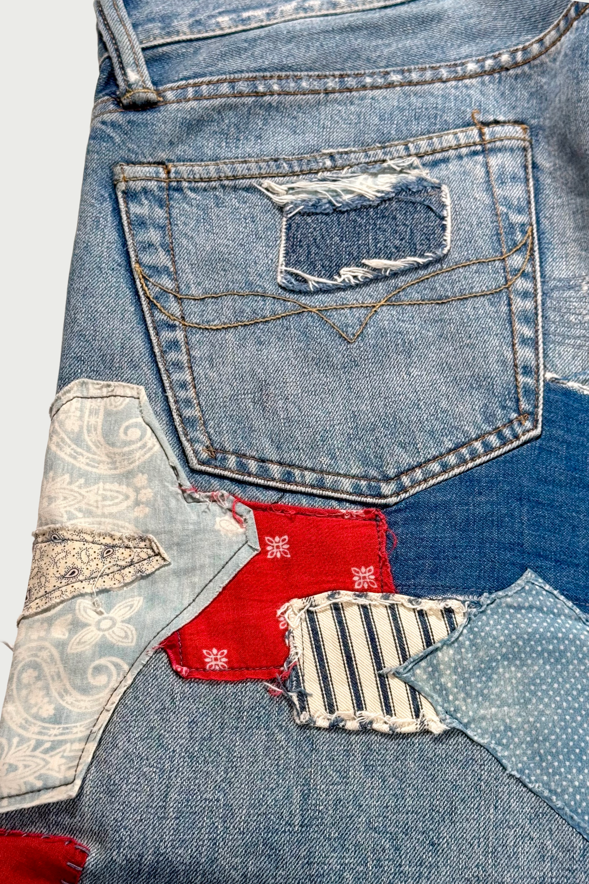 Repaired patchwork jeans