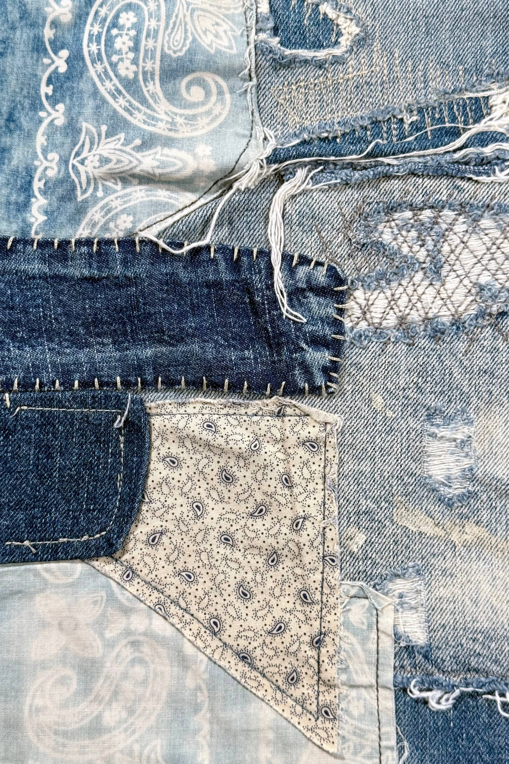 Repaired patchwork jeans